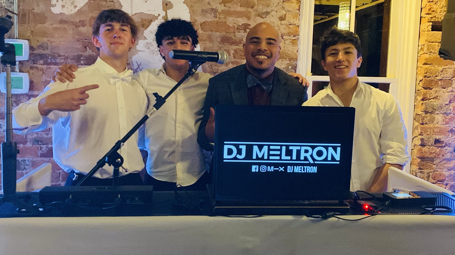 DJ Meltron with event guests